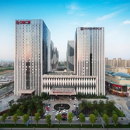 Отель Wanda Realm Jinhua Экстерьер фото
