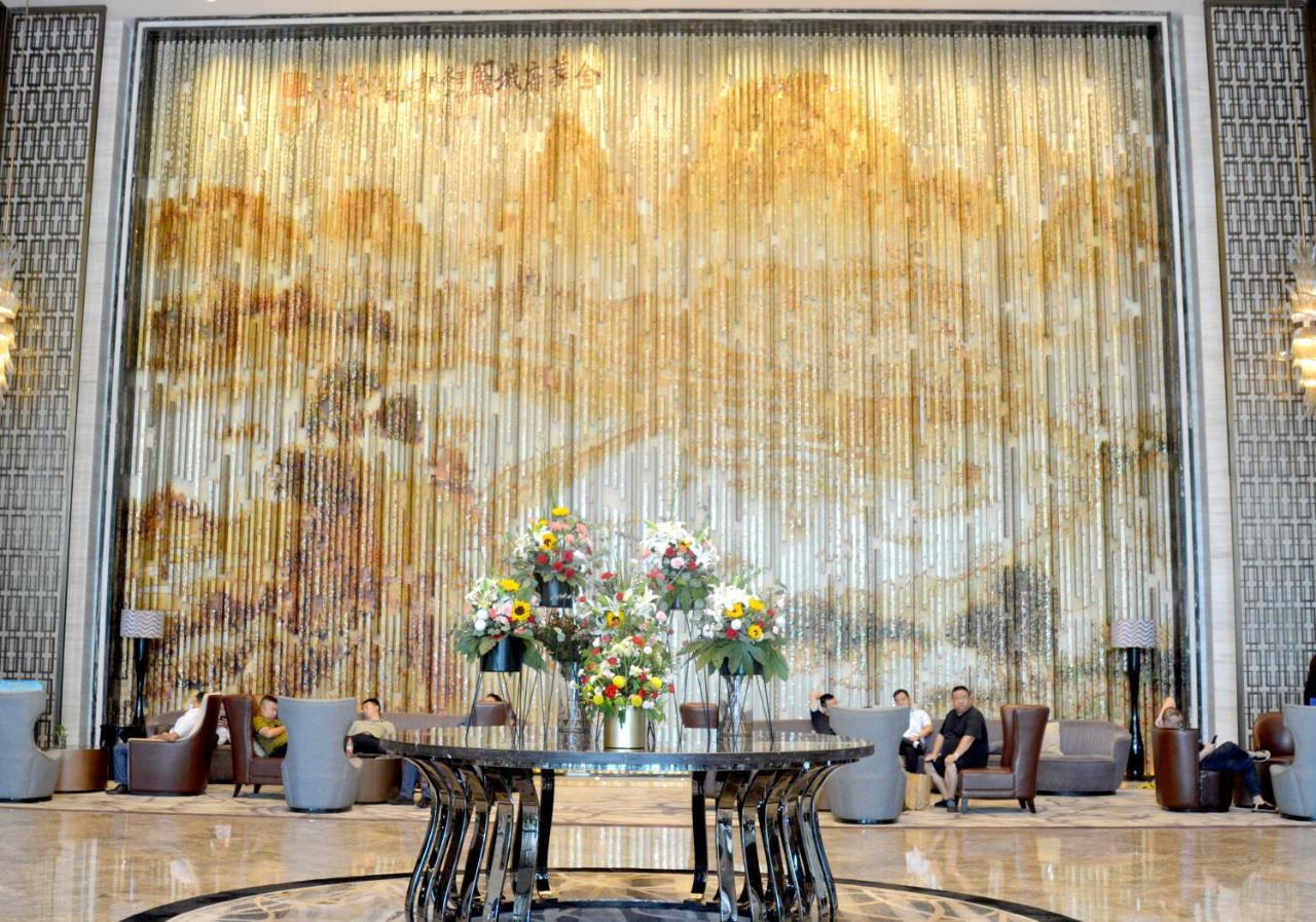Отель Wanda Realm Jinhua Экстерьер фото