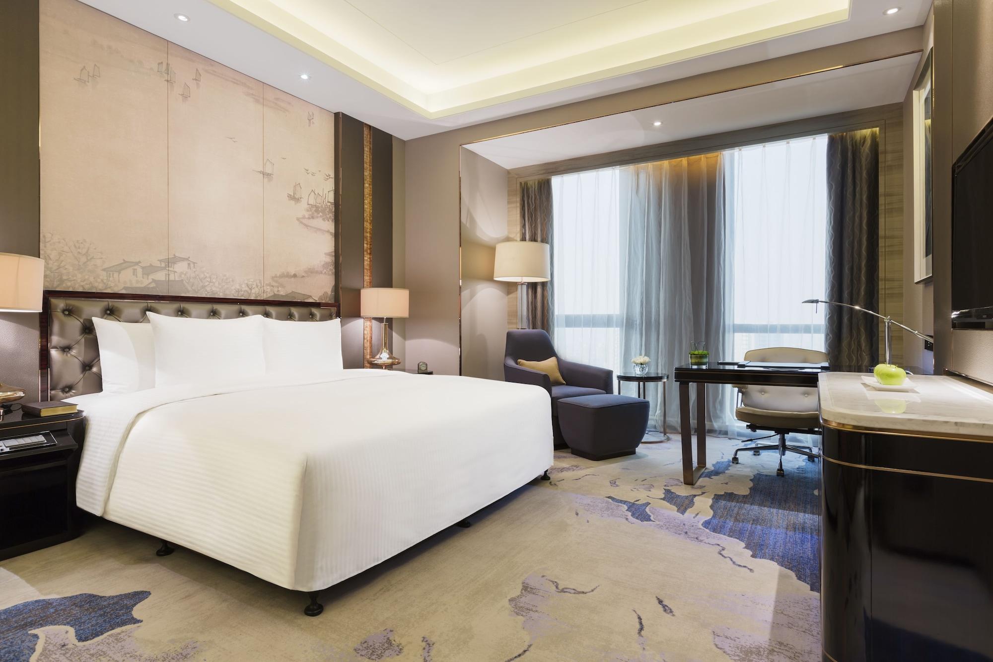 Отель Wanda Realm Jinhua Экстерьер фото