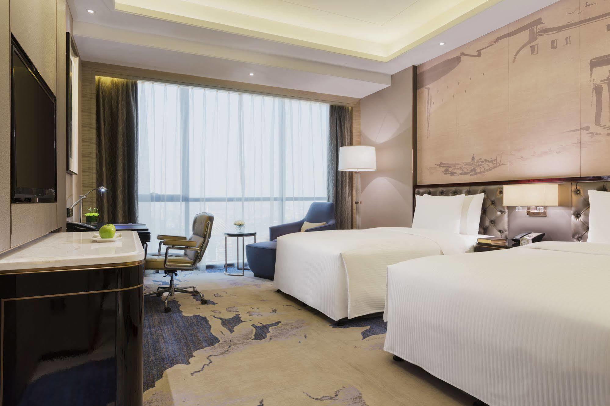 Отель Wanda Realm Jinhua Экстерьер фото