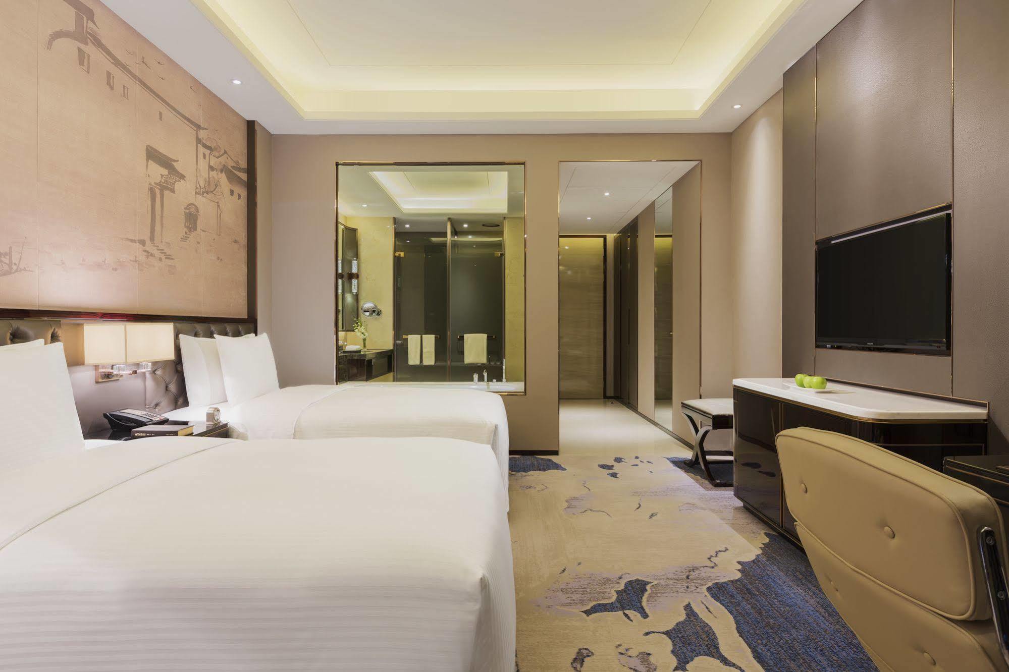 Отель Wanda Realm Jinhua Экстерьер фото