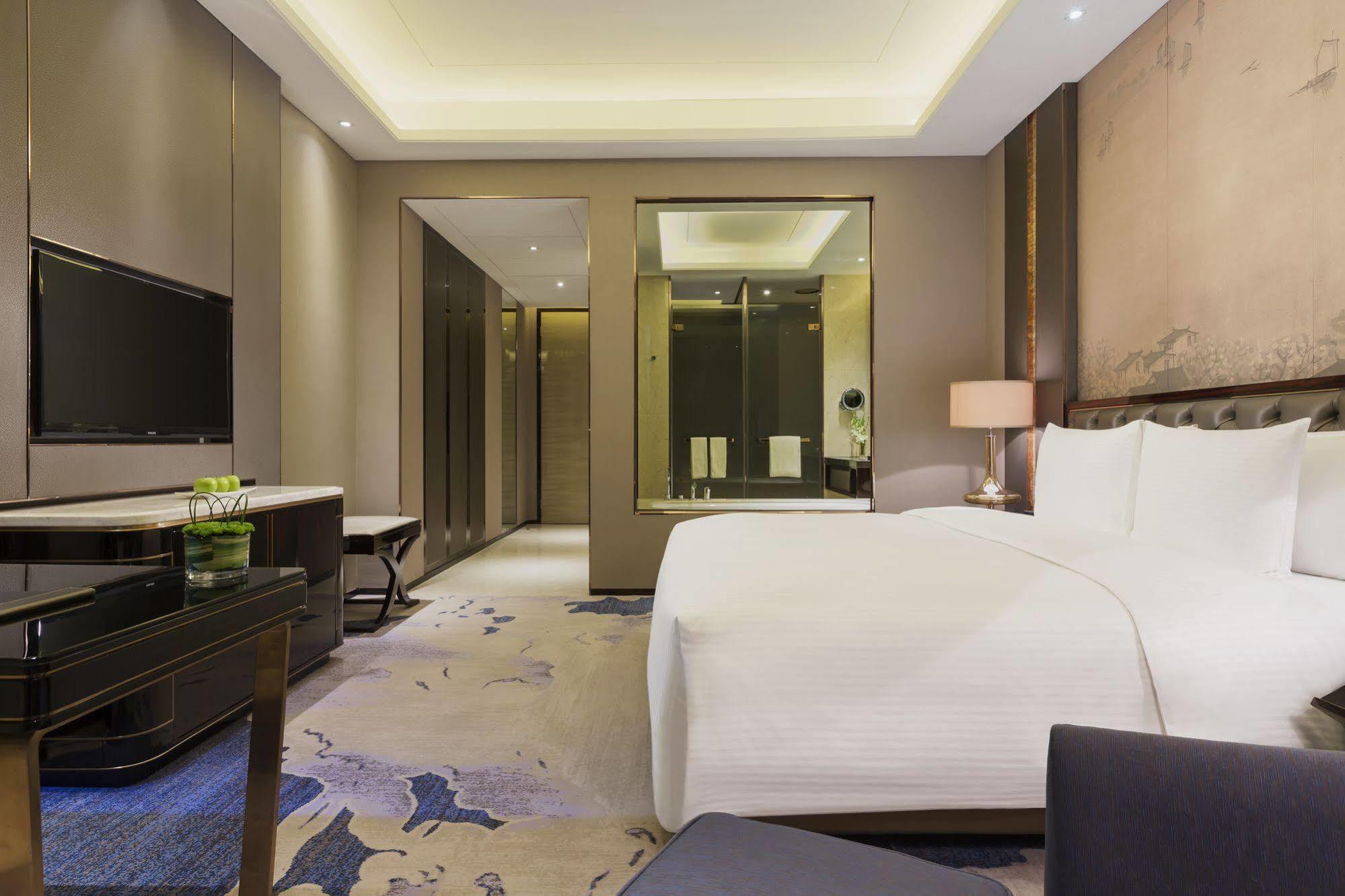 Отель Wanda Realm Jinhua Экстерьер фото